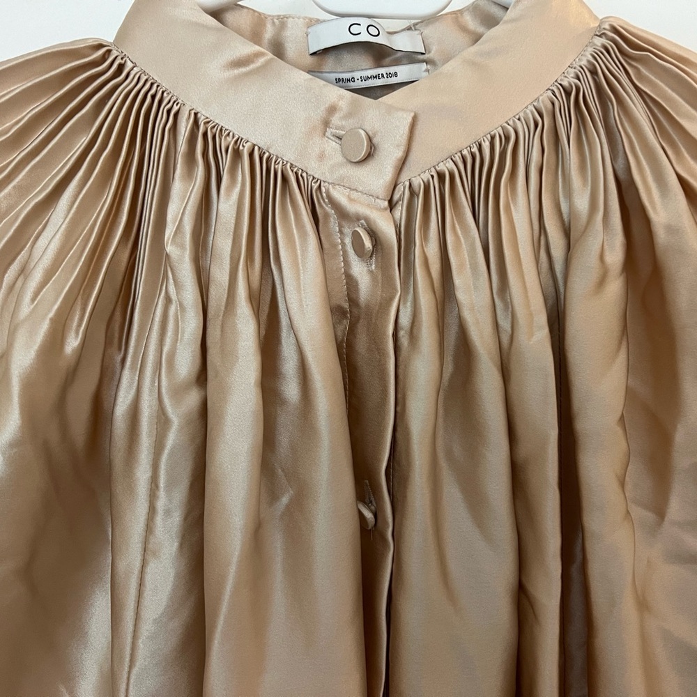 Silky beige blouse made by Co Collections. Women’s Small